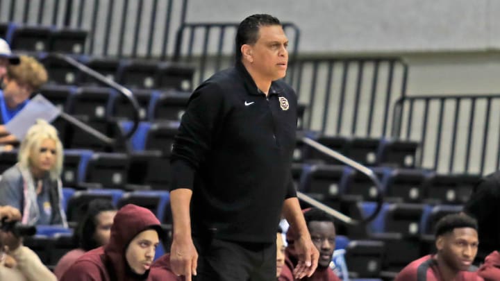 Bethune Cookman’s Head Coach Reggie Theus keeps and eye on the game during the ro College Basketball Invitational held at Ocean Center on Saturday, March 23, 2024.