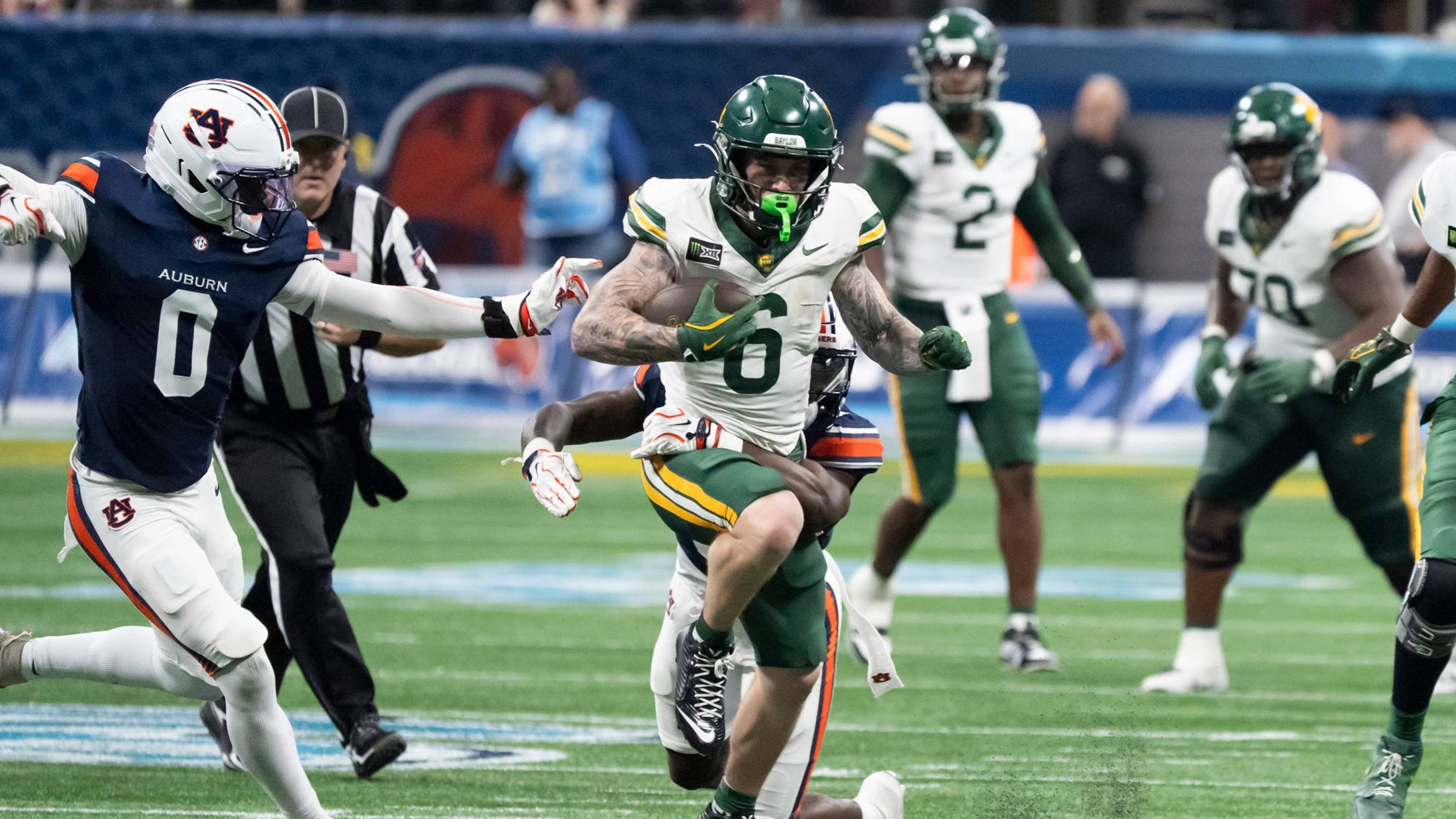Baylor Bears wide receiver Gavin Freeman (6) runs up field after a catch as Auburn Tigers take on Baylor Bears in the Aflac Kickoff Game at Mercedes-Benz Stadium in Atlanta, Ga. on Saturday, Sept. 5, 2026. Auburn Tigers defeated Baylor Bears 17-16. | USA TODAY Network via Reuters Connect