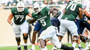 Michigan State's Nathan Carter runs for his third touchdown in the third quarter against Richmond on Saturday, Sept. 9, 2023, at Spartan Stadium in East Lansing.