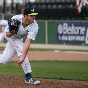 Jack Choate delivers a pitch as the Bravehearts take on Westfield during their home opener on Wednesday.