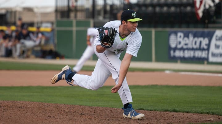 Jack Choate delivers a pitch as the Bravehearts take on Westfield during their home opener on Wednesday.