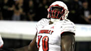 Louisville offensive lineman Trevor Reid reacts against UCF during the first half Friday, Sept. 9, 2022, in Orlando, Fla.