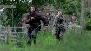 Jamie (Aaron Taylor-Johnson) and his son Spike (Alfie Williams) in Columbia Pictures' 28 YEARS LATER.