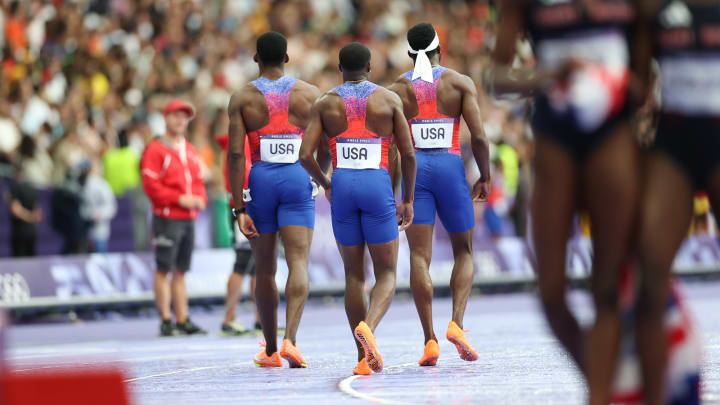 The United States men's 4x100-meter relay team walks away after being disqualified during the 2024 Summer Olympics.