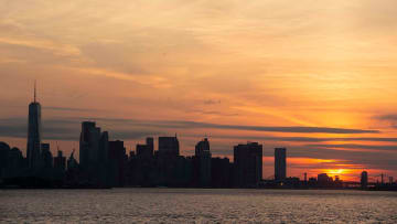 A solar eclipse rises behind the New York City Skyline on June 10, 2021. Approximately 80% of the sun was blocked by the moon.