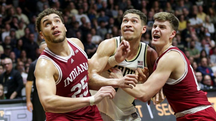 Indiana forward Race Thompson (25) and Indiana forward Miller Kopp (12) box out Purdue forward Mason Gillis (0) during the second half of an NCAA men's basketball game, Saturday, March 5, 2022 at Mackey Arena in West Lafayette.

Bkc Purdue Vs Indiana

Syndication Journal Courier