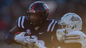 Mississippi's defensive tackle JJ Pegues (38) scores a touchdown during the Egg Bowl game against Mississippi State at Vaught-Hemingway Stadium on Friday, Nov. 29, 2024.