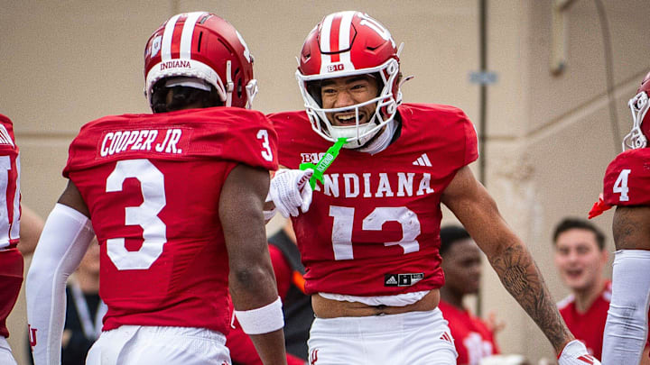 Indiana's Elijah Sarratt (13) and Omar Cooper Jr. (3) celebrates Sarratt's touchdown during the Indiana versus Michigan football game at Memorial Stadium on Friday, Nov. 9, 2024. Indiana's Elijah Sarratt (13) and Omar Cooper Jr. (3) celebrates Sarratt's touchdown during the Indiana versus Michigan football game at Memorial Stadium on Friday, Nov. 9, 2024.