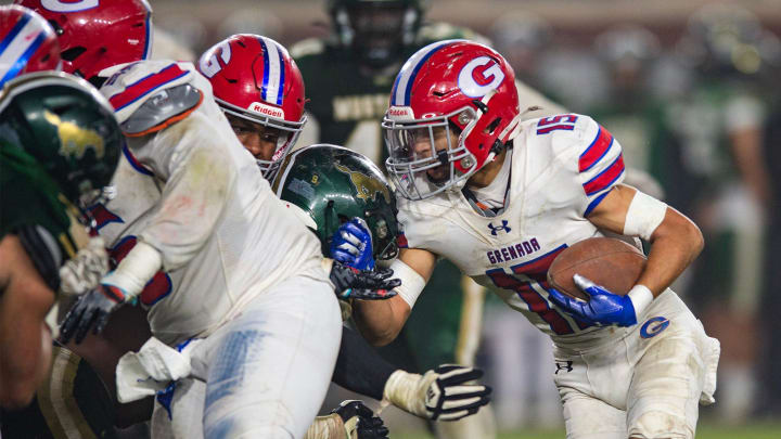 Grenada Chargers' running back Latavien Pritchard (15) runs the ball during the MHSAA class 6A football state title game at Vaught-Hemingway Stadium in Oxford, Miss., on Friday, Dec. 1, 2023.