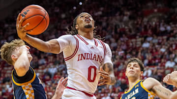 Indiana's Jakai Newton (0) scores during the the Indiana versus Marian men's basketball exhibition game at Simon Skjodt Assembly Hall on Friday, Nov. 1, 2024.