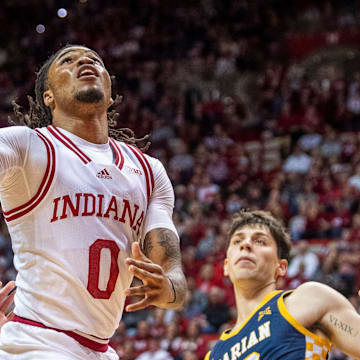 Indiana's Jakai Newton (0) scores during the the Indiana versus Marian men's basketball exhibition game at Simon Skjodt Assembly Hall on Friday, Nov. 1, 2024.