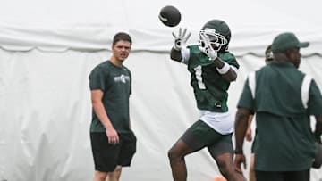 MSU WR Omari Kelly snags a pass, Tuesday, July 29, 2025, during the first day of football practice at the Skandalaris Football Center.
