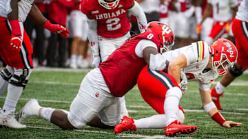 Indiana's CJ West (8) sacks Maryland's Billy Edwards Jr. (9) during the Indiana versus Maryland football game at Memorial Stadium on Saturday, Sept. 28, 2024.