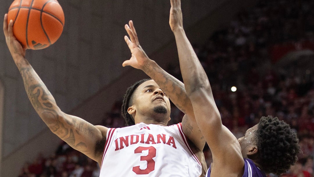 Indiana's Lamar Wilkerson (3) shoots over Northwestern's Jordan Clayton (11) during the Indiana versus Northwestern men's basketball game at Simon Skjodt Assembly Hall on Tuesday, Feb. 24, 2026.