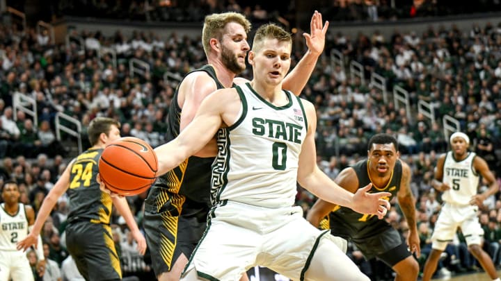 Michigan State's Jaxon Kohler moves the ball against Iowa during the first half on Tuesday, Feb. 20, 2024, at the Breslin Center in East Lansing.