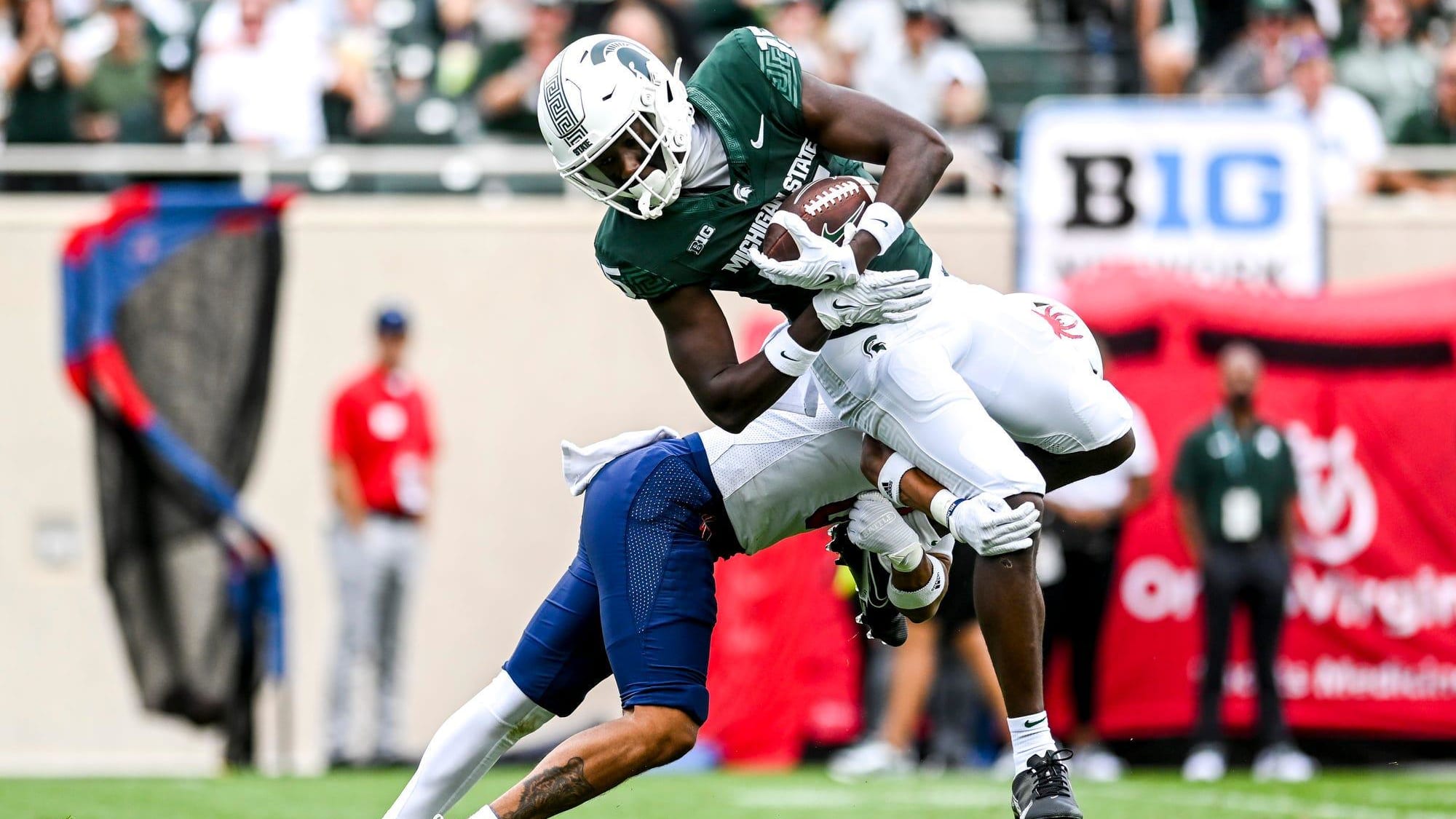 Michigan State Spartans football wide receiver Jaron Glover catches a pass against Richmond on Saturday, Sept. 9, 2023.