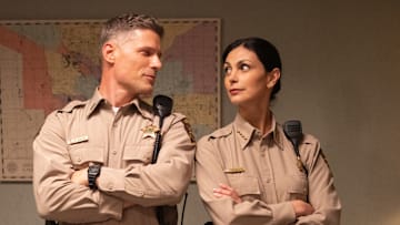"Pilot" - Sheriff Country. PIctured: Matt Lauria as Nathan Boone and Morena Baccarin as Sheriff Mickey Fox. Photo: Brooke Palmer/CBS ©2025 CBS Broadcasting, Inc. All Rights Reserved.