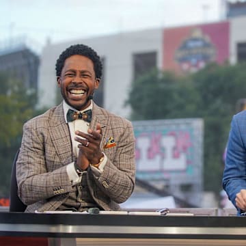 College Gameday hosts Desmond Howard, and 
Rece Davis during the Broadcasting of the show before the match off between Texas Longhorns and Oklahoma Sooners in NCAA college football game at the Cotton Bowl on Saturday, Oct. 7, 2023 in Dallas, Texas. This game makes up the119th rivalry match up.