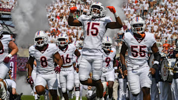 Sep 20, 2025; Blacksburg, Va.; Virginia Tech safety Brennan Johnson (15) celebrates as he enters the stadium.