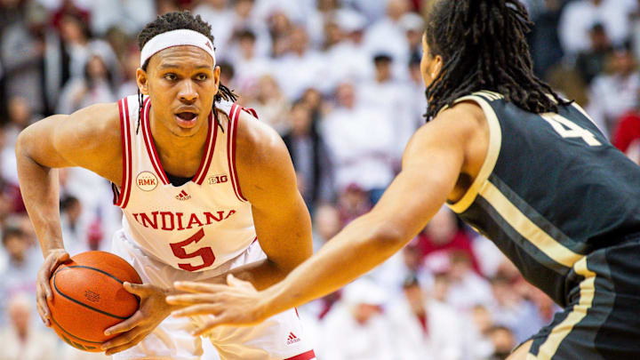 Indiana's Malik Reneau (5) looks to pass with Purdue's Trey Kaufman-Renn defending him at Assembly Hall.