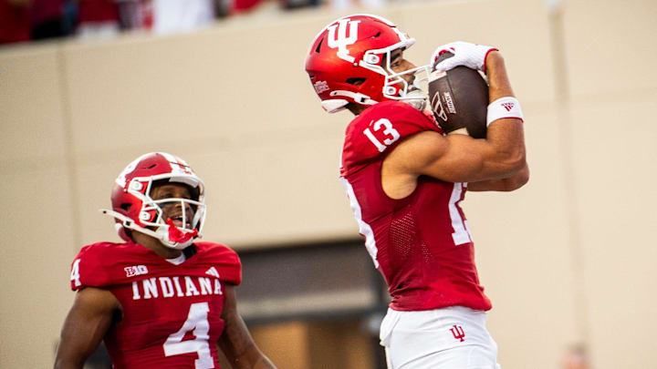 Indiana's Elijah Sarratt (13) celebrates a touchdown during the Indiana versus Western Illinois football game at Memorial Stadium on Friday, Sept. 6, 2024.