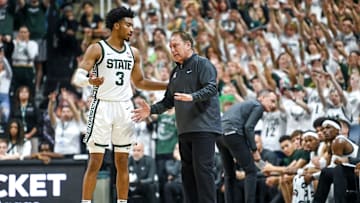 Michigan State's head coach Tom Izzo, right, talks with Jaden Akins during the first half in the game against James Madison on Monday, Nov. 6, 2023, in East Lansing.