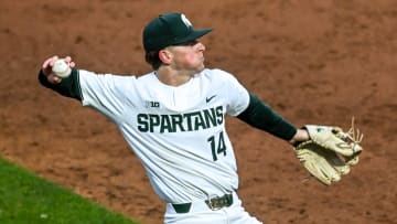 Michigan State's Mitch Jebb fields a ball hit by Michigan during the sixth inning on Friday, April 15, 2022, at Jackson Field in Lansing.

220415 Msu Mich Baseball 121a