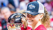 Indiana's Grace Berger (34) poses with the Big Ten Championship Trophy after the second half of the Indiana versus Purdue women's basketball game at Simon Skjodt Assembly Hall on Sunday, Feb. 19, 2023.