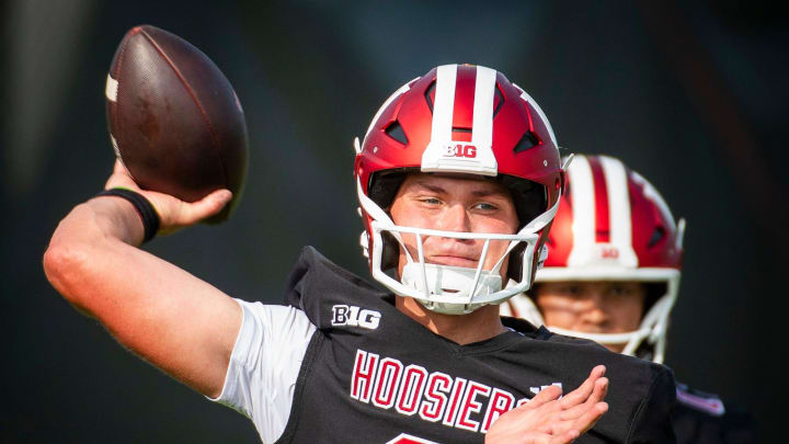 Indiana University's Kurtis Rourke (9) passes during the first day of fall practice at the Mellencamp Pavilion at Indiana University on Wednesday, July 31, 2024.