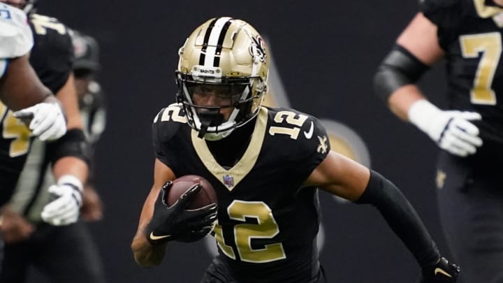 Sep 10, 2023; New Orleans, LA, USA; New Orleans Saints wide receiver Chris Olave (12) runs for a first down in the second quarter against the Tennessee Titans at Caesars Superdome. Mandatory Credit: Andrew Nelles-USA TODAY Sports