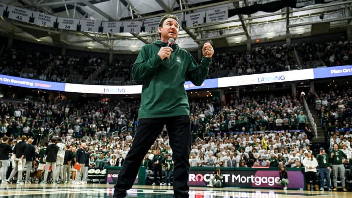 Michigan State's new football coach Jonathan Smith speaks to the crowd during a timeout in the basketball game against Georgia Southern on Tuesday, Nov. 28, 2023, at the Breslin Center in East Lansing.