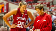 Indiana Head Coach Teri Moren talks with Julianna LaMendola (20) during the Indiana versus Maine women's basketball game at Simon Skjodt Assembly Hall on Sunday, Dec. 1, 2024.