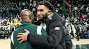 Former Michigan State player Denzel Valentine, right, hugs coach Mike Garland after the Spartans beat Michigan on Saturday, Jan. 29, 2022, at the Breslin Center in East Lansing.

220129 Msu Mich 285a