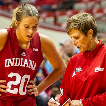 Indiana Head Coach Teri Moren talks with Julianna LaMendola (20) during the Indiana versus Maine women's basketball game at Simon Skjodt Assembly Hall on Sunday, Dec. 1, 2024.