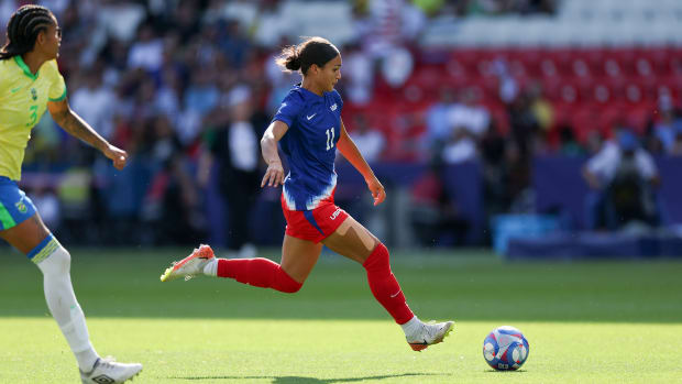 USWNT forward Sophia Smith dribbles during the gold-medal game against Brazil.