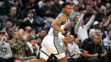 Michigan State's Tyson Walker gets back on defense after a 3-pointer against Iowa during the first