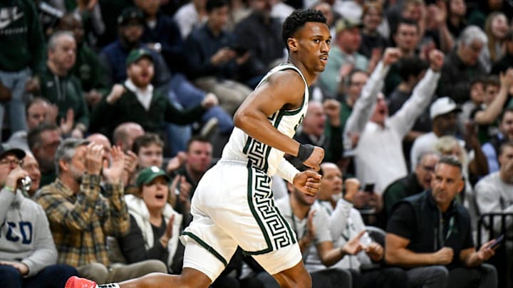 Michigan State's Tyson Walker gets back on defense after a 3-pointer against Iowa during the first