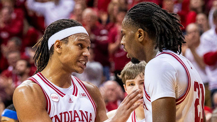 Indiana forwards Malik Reneau (left) and Mackenzie Mgbako talk during a game against Kansas on Saturday, Dec. 16, 2023.