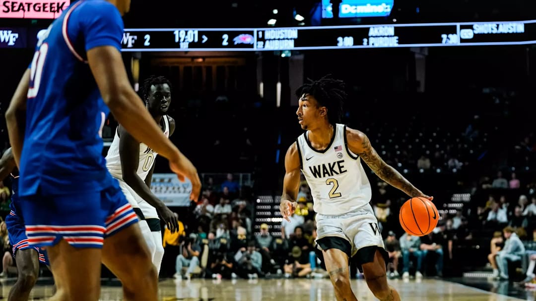 Wake Forest forward Juke Harris dribbles the ball 