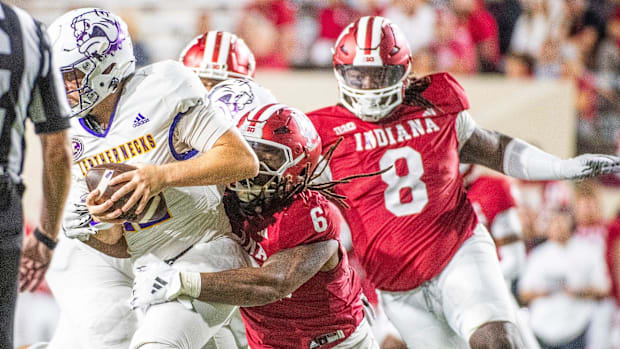 Indiana's Mikail Kamara (6) sacks Western Illinois' Nathan Lamb (12) during the Indiana versus Western Illinois football game