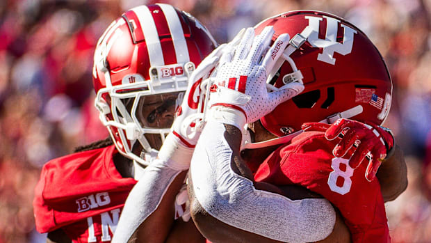 Indiana players celebrate a blowout win over Nebrask