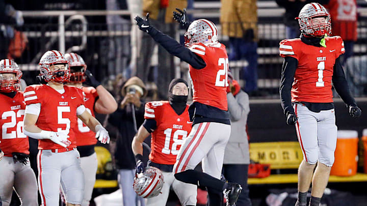 Shelby High School celebrates their 42-7 win over Indian Hill High School during OHSAA Division IV State Semifinal high school football action Friday, Nov. 28, 2025 at Sidney High School. TOM E. PUSKAR/MANSFIELD NEWS JOURNAL