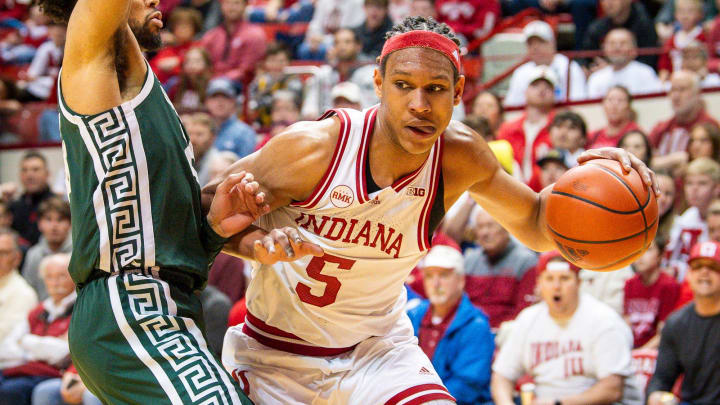 Indiana's Malik Reneau (5) works on Michigan State's Malik Hall (25) during the first half of the Indiana versus Michigan State men's basketball game at Simon Skjodt Assembly Hall on Sunday, March 10, 2024.