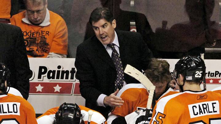 May 12, 2010; Philadelphia, PA USA;  Philadelphia Flyers coach Peter Laviolette talks to his team during the 3rd period of game six of the Eastern Conference semifinals against the Boston Bruins at the Wachovia Center in Philadelphia. The Flyers defeated the Burins 2-1. Mandatory Credit: Eric Hartline-Imagn Images