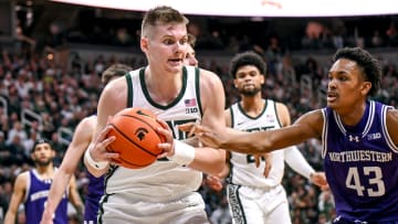 Michigan State's Jaxon Kohler, left, gets a rebound as Northwestern's Blake Smith closes in during the first half on Wednesday, March 6, 2024, at the Breslin Center in East Lansing.