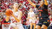 Indiana's Mackenzie Holmes (54) looks to score over Maryland's Brinae Alexander (5) during the first half of the Indiana versus Maryland women's basketball game at Simon Skjodt Assembly Hall on Sunday, March 3, 2024.