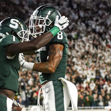 Michigan State's Jayden Reed, left, celebrates his touchdown against  Nebraska with teammate Jalen Nailor during the second quarter on Saturday, Sept. 25, 2021, at Spartan Stadium in East Lansing.

210925 Msu Nebraska 124a