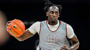 Arthur Kaluma drives the ball to the basket during a practice session that was held at the Moody Center for the local media. Sports writers got their first glimpse of the 2024-25 team at this event.