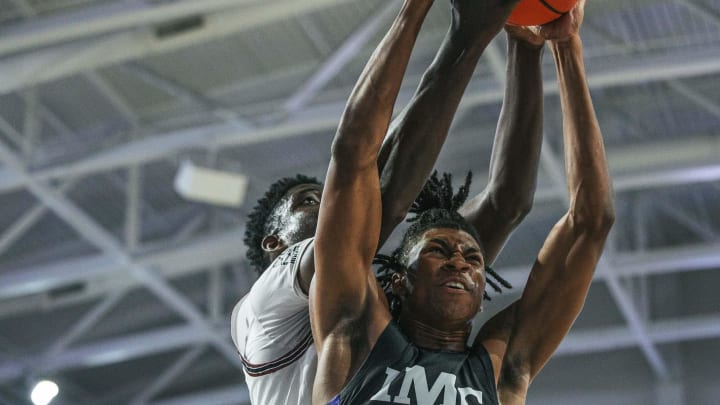 Donnie Freeman of IMG Academy goes up for a rebound in the Fifth-Place game of the City of Palms Classic on Saturday, Dec. 23, 2023, at Suncoast Credit Union Arena in Fort Myers. Don Bosco Prep won 96-92.