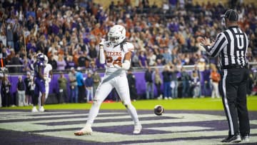 Texas Longhorns running back Jonathon Brooks (24) celebrates after he runs into the end zone for a touchdown against TCU Horned Frogs in the first quarter of an NCAA college football game, Saturday, November. 11, 2023, at Amon G. Carter Stadium in Fort Worth, Texas.